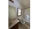 Clean bathroom with tub, toilet, and vanity at 5941 S Quail Way, Littleton, CO 80127