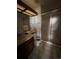 Bathroom with a shower and single sink vanity at 5941 S Quail Way, Littleton, CO 80127