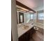 Updated bathroom with a large vanity and bathtub at 5941 S Quail Way, Littleton, CO 80127