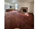 Living room with a fireplace and carpeting at 5941 S Quail Way, Littleton, CO 80127
