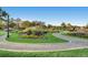 Landscaped park with winding pathways and lush greenery at 460 S Marion Pkwy # 702, Denver, CO 80209