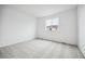 Simple bedroom with carpet flooring and a window at 6594 N Malta St, Aurora, CO 80019