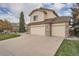 Two-story house with attached two-car garage at 9357 Lark Sparrow Dr, Highlands Ranch, CO 80126