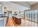 Updated kitchen boasts a large island, stainless steel appliances, and ample cabinet space at 9357 Lark Sparrow Dr, Highlands Ranch, CO 80126