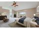 Spacious main bedroom with sitting area and views at 9357 Lark Sparrow Dr, Highlands Ranch, CO 80126