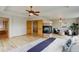 Large bedroom with fireplace, sitting area and access to bathroom at 15453 E 109Th Ave, Commerce City, CO 80022