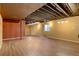 Spacious unfinished basement with high ceilings and lighting at 15453 E 109Th Ave, Commerce City, CO 80022