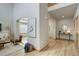 Bright entryway with hardwood floors and a view into the living room at 15453 E 109Th Ave, Commerce City, CO 80022