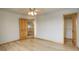 Bright bedroom with hardwood floors and spacious closet at 15453 E 109Th Ave, Commerce City, CO 80022