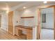 Built-in office space with wood shelving and desk at 15453 E 109Th Ave, Commerce City, CO 80022
