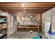 Basement workshop area with workbench and storage at 11343 W 60Th Pl, Arvada, CO 80004