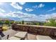 Spacious patio with mountain views, perfect for relaxing and entertaining at 711 Hiddenbrook Ct, Highlands Ranch, CO 80126