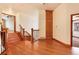 Spacious upper hallway with hardwood floors and storage at 6731 S Newcombe Way, Littleton, CO 80127