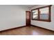 Well-lit bedroom featuring hardwood floors and classic wood trim at 3525 W 26Th Ave, Denver, CO 80211