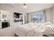 Spacious main bedroom with large windows and ensuite bathroom access at 4905 N Kalispell St, Denver, CO 80239