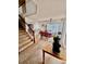 Dining area with table and chairs, view of stairs and kitchen at 21030 E 39Th Ave, Denver, CO 80249
