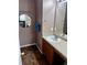 Bathroom with double vanity, tile floor, and a large mirror at 21030 E 39Th Ave, Denver, CO 80249