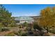 House exterior showcasing a metal roof and landscaping at 4880 Tall Horse Trl, Sedalia, CO 80135