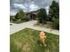 Two-story house with a front yard and driveway at 25605 E Maple Pl, Aurora, CO 80018