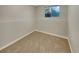 Bright and airy basement bedroom with neutral wall colors at 1822 S Joplin St, Aurora, CO 80017