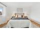 Spacious bedroom with hardwood floors and neutral decor at 252 N Pennsylvania St # 305, Denver, CO 80203