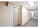 Apartment building hallway with carpet and neutral tones at 660 S Alton Way # 7A, Denver, CO 80247