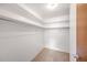 Spacious walk-in closet with ample shelving and hanging space at 660 S Alton Way # 7A, Denver, CO 80247