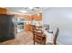 Kitchen with stainless steel appliances and wood cabinets at 660 S Alton Way # 7A, Denver, CO 80247
