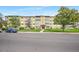 Exterior view of an apartment building with landscaping at 660 S Alton Way # 7A, Denver, CO 80247