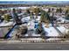 House with a large backyard, snow-covered lawn and a quiet neighborhood at 6101 S University Blvd, Centennial, CO 80121