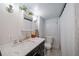 Clean bathroom with a marble countertop and a shower/tub combo at 6101 S University Blvd, Centennial, CO 80121