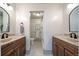 Elegant bathroom with double vanity, updated fixtures, and a shower/tub combo at 6101 S University Blvd, Centennial, CO 80121