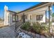 House exterior showcasing a covered porch, landscaping, and architectural details at 6101 S University Blvd, Centennial, CO 80121