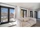 Bright office space featuring large windows and a comfortable couch at 6101 S University Blvd, Centennial, CO 80121