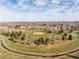 Aerial view of park with baseball field and playground at 2648 S Pennsylvania St, Denver, CO 80210