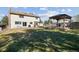 Spacious backyard with a large deck and gazebo, perfect for outdoor entertaining at 5895 S Killarney Way, Centennial, CO 80015