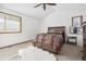 Comfortable bedroom with ceiling fan and large bed at 5895 S Killarney Way, Centennial, CO 80015