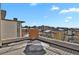 Private rooftop deck with city views and room for relaxing at 30 S Oneida St, Denver, CO 80230