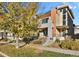 Modern two-story home with landscaped yard and attached two-car garage at 30 S Oneida St, Denver, CO 80230