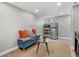 Finished basement features a comfortable sitting area, kitchenette, and plenty of storage at 1454 Rosemary St, Denver, CO 80220