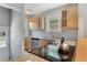 Kitchen with double sink and wood cabinets at 1454 Rosemary St, Denver, CO 80220