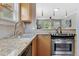 Granite countertops and stainless steel appliances at 1454 Rosemary St, Denver, CO 80220