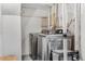 Basement laundry area with a side-by-side washer and dryer set at 1454 Rosemary St, Denver, CO 80220