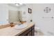 Clean bathroom with granite countertop and shower/tub combo at 3408 S Kittredge St, Aurora, CO 80013