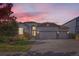 House exterior with two-car garage and landscaping at 6803 Ponderosa St, Frederick, CO 80530