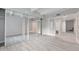 Bedroom with mirrored closet doors and access to hallway at 9995 E Harvard Ave # 179, Denver, CO 80231
