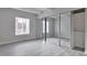 Bedroom with mirrored closet and view of building exterior at 9995 E Harvard Ave # 179, Denver, CO 80231