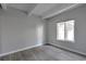 Spacious bedroom with large window and wood-look floors at 9995 E Harvard Ave # 179, Denver, CO 80231