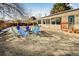 Spacious backyard with hot tub and patio seating at 951 S Fulton St, Aurora, CO 80247