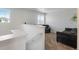 Upstairs loft area with seating and natural light at 1160 Cardinal Ave, Brighton, CO 80601